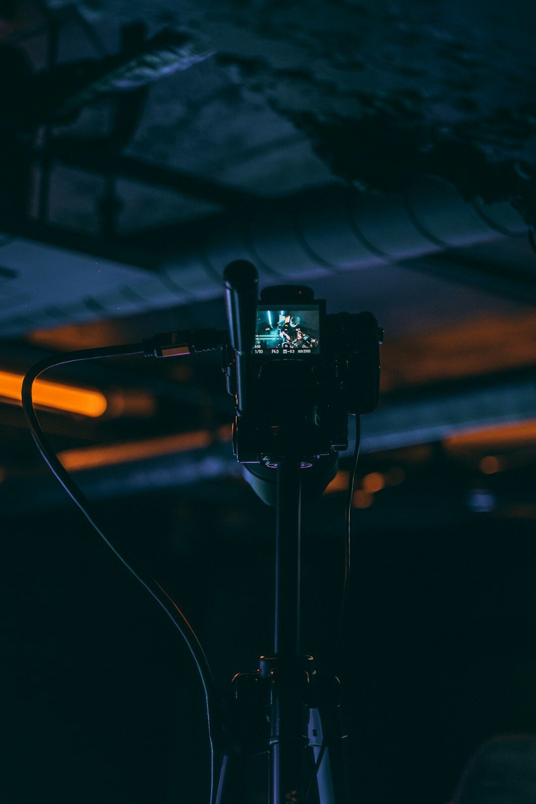 Professional video camera close-up on a tripod